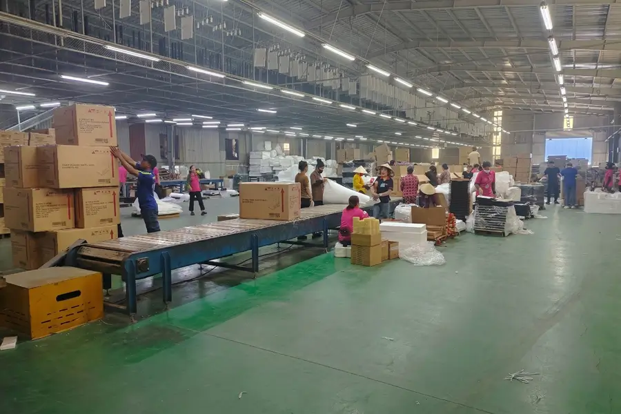 Efficient packaging line for KD-structured bathroom vanities and furniture.