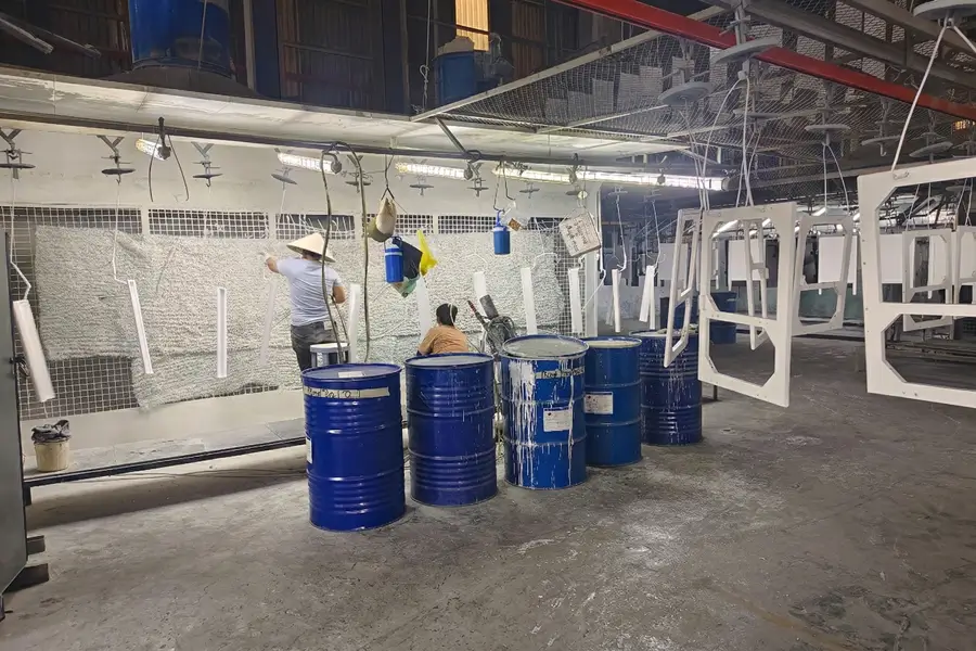 Professional spray painting booth for high-end bathroom vanity finishing.